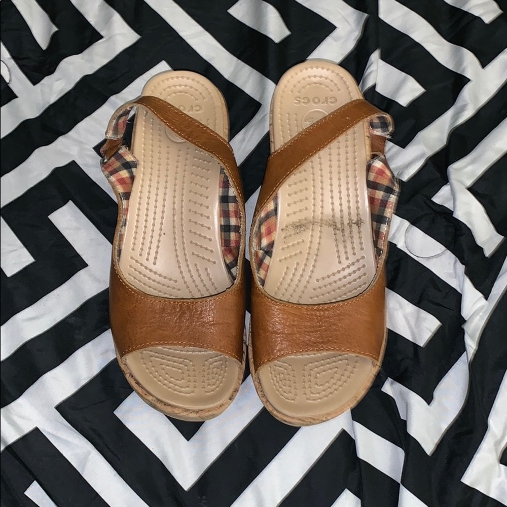 Short Crocs wedges that are lightly worn.